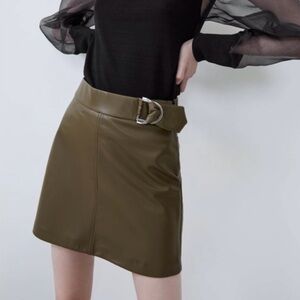 Zara. Small, olive green faux leather mini skirt with belt detail